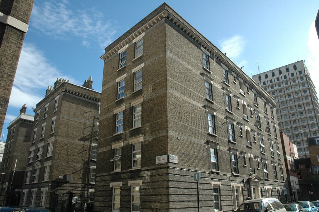 Housing estate context representing condemned garages and controlled enclosure works